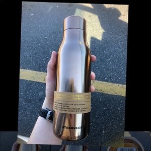 Rose gold Starbucks vacuum insulated bottle. Keeps drinks cold or hot.